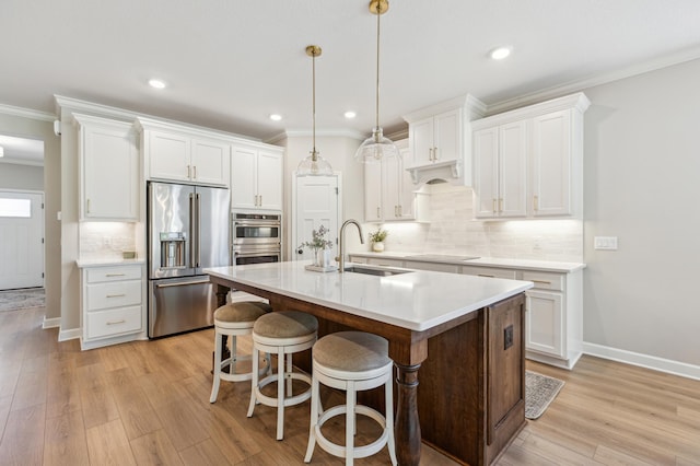 8014 Walnut Ln, Corcoran, MN 55340 - kitchen with appliances with stainless steel finishes, crown molding, white cabinets, recessed lighting, and light countertops