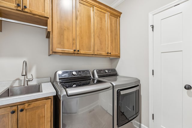 8014 Walnut Ln, Corcoran, MN 55340 - laundry area with washer and clothes dryer and cabinet space