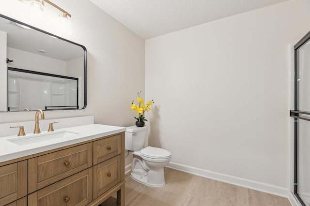 8014 Walnut Ln, Corcoran, MN 55340 - bathroom with a shower, vanity, and wood finished floors
