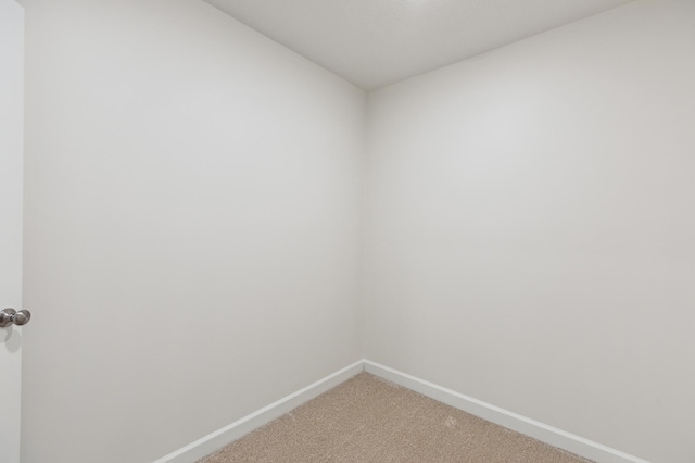 8014 Walnut Ln, Corcoran, MN 55340 - spare room featuring baseboards and light carpet