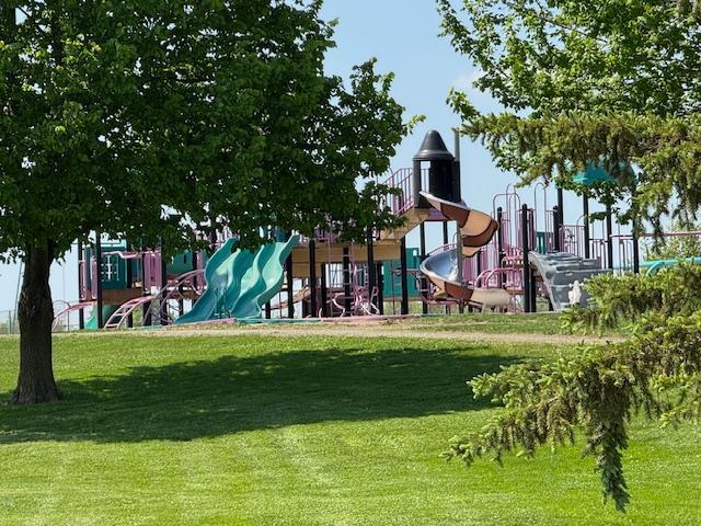 8014 Walnut Ln, Corcoran, MN 55340 - community playground featuring a yard