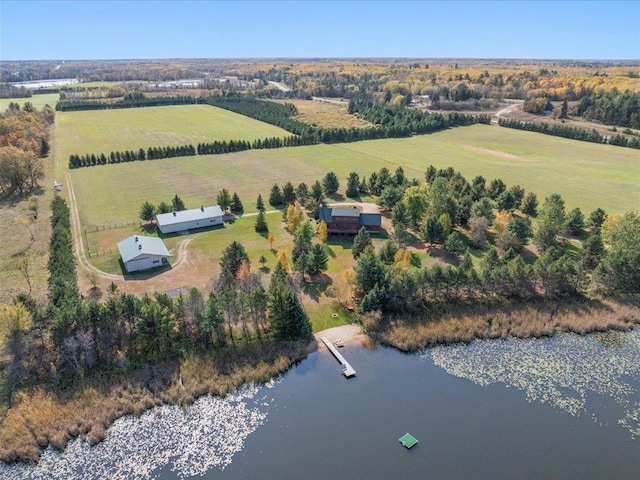 aerial view of property's location featuring rural landscape and a large body of water