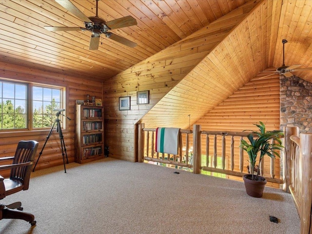 home office featuring ceiling fan, vaulted ceiling, rustic walls, carpet flooring, and wooden ceiling