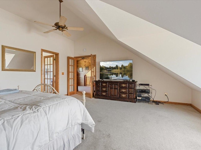 bedroom featuring carpet, vaulted ceiling, baseboards, and ceiling fan