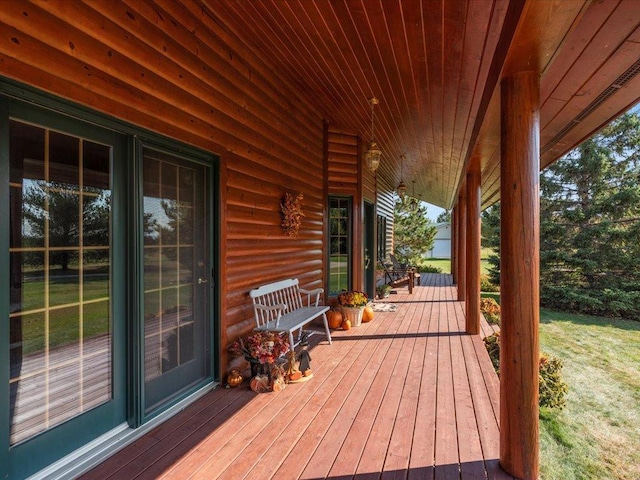 wooden terrace with covered porch