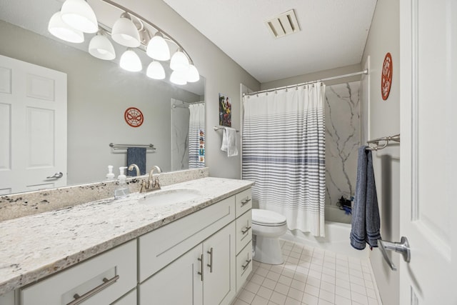 bathroom featuring tile patterned floors, toilet, vanity, and shower / tub combo with curtain
