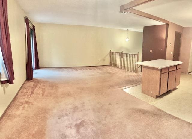 spare room with light carpet