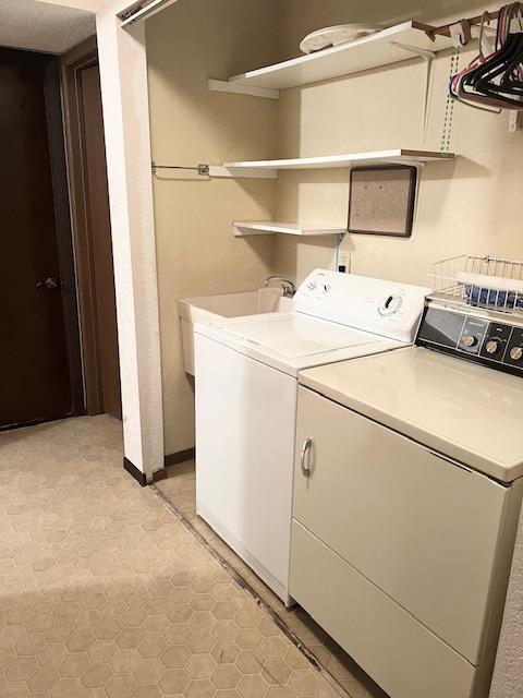 washroom featuring separate washer and dryer