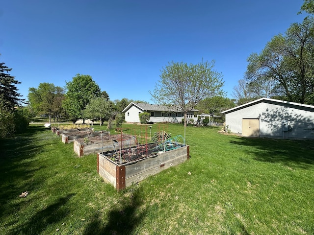 4220 23rd St NW, Willmar, MN 56201 - view of grassy yard with a garden