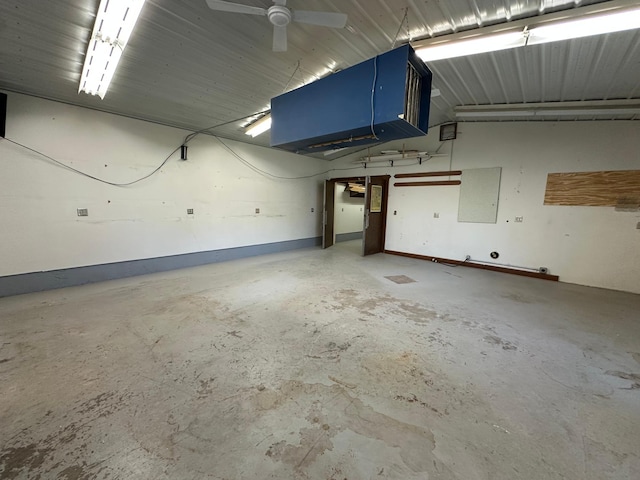4220 23rd St NW, Willmar, MN 56201 - garage featuring a ceiling fan