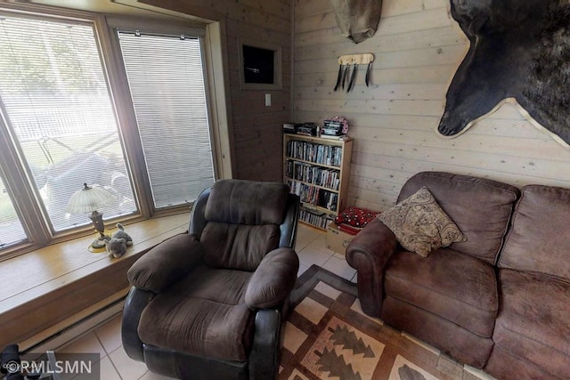 404 Clayborn Ave, Parkers Prairie, MN 56361 - sitting room featuring tile patterned flooring and wooden walls