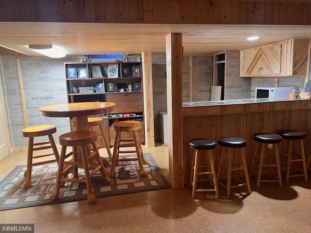 404 Clayborn Ave, Parkers Prairie, MN 56361 - indoor bar featuring wooden ceiling and white microwave