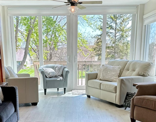 sunroom / solarium with wood finished floors