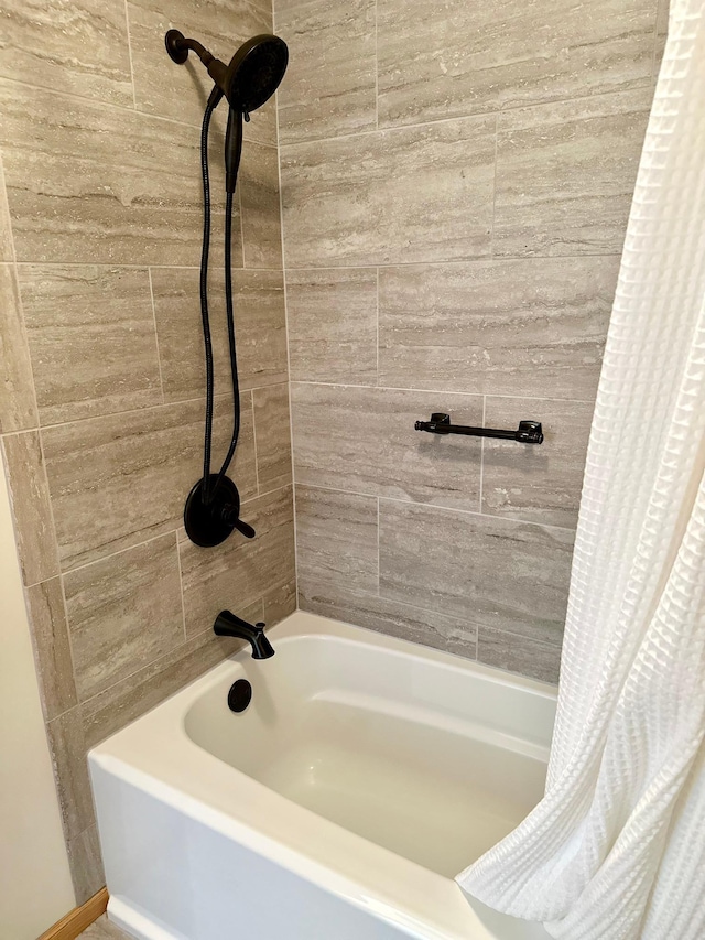 full bath featuring shower / bath combo