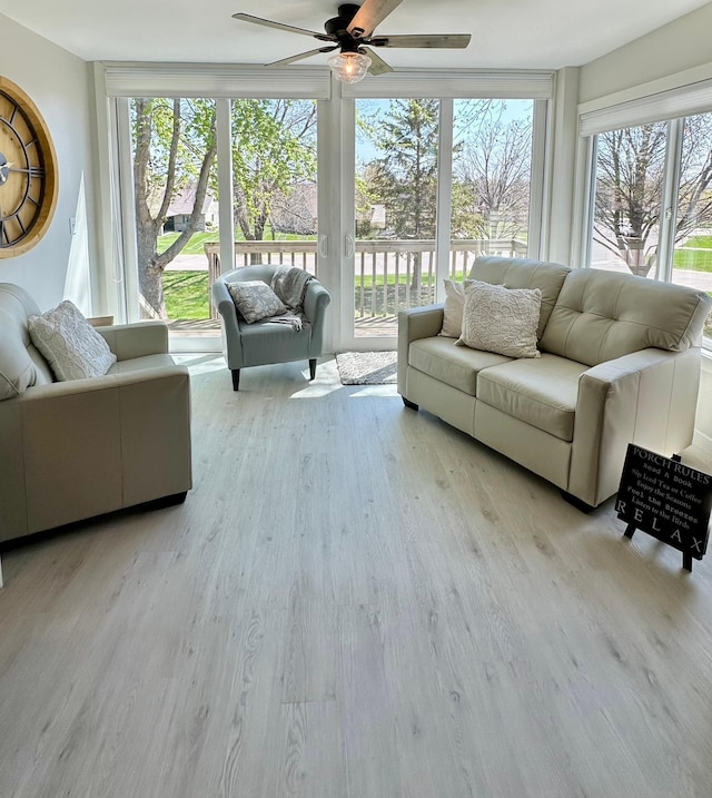 sunroom / solarium with wood finished floors