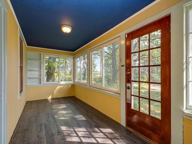 5844 Stagecoach Trl N, Oak Park Heights, MN 55082 - unfurnished sunroom featuring wood finished floors, healthy amount of natural light, and crown molding