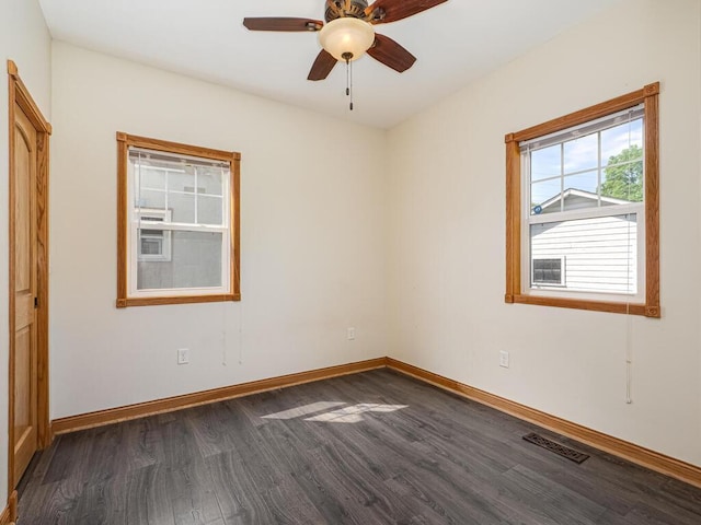 5844 Stagecoach Trl N, Oak Park Heights, MN 55082 - empty room with dark wood-style flooring and ceiling fan