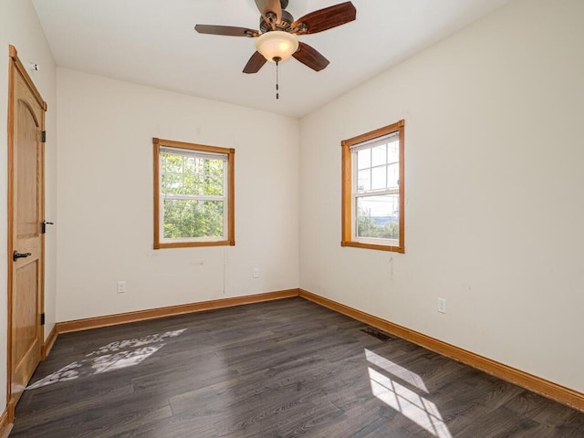 5844 Stagecoach Trl N, Oak Park Heights, MN 55082 - unfurnished room with dark wood-style flooring and ceiling fan