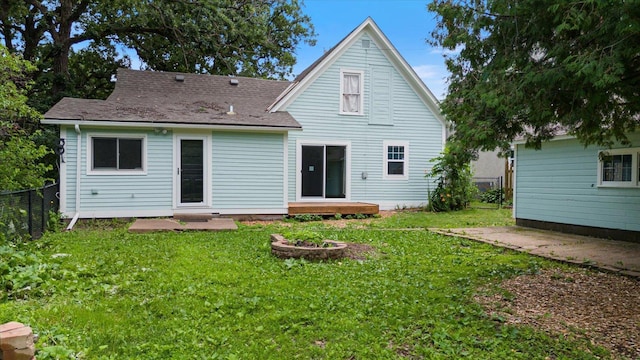 5844 Stagecoach Trl N, Oak Park Heights, MN 55082 - back of property featuring a patio area and roof with shingles