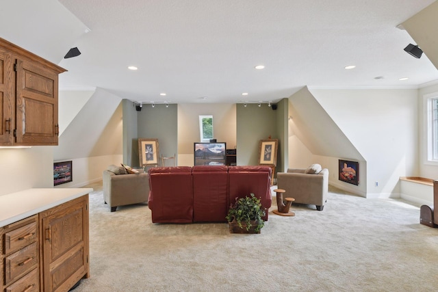 living room featuring light carpet, healthy amount of natural light, recessed lighting, and baseboards