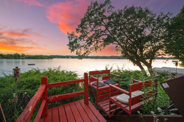 deck at dusk with a water view