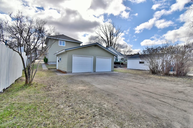 419 5th St NE, Staples, MN 56479 - garage featuring dirt driveway
