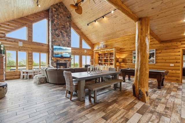 5784 Mcgowan Rd, Brainerd, MN 56401 - dining room featuring track lighting, high vaulted ceiling, wooden ceiling, a stone fireplace, and pool table