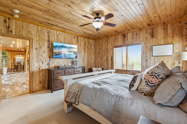 5784 Mcgowan Rd, Brainerd, MN 56401 - bedroom with wood walls, wooden ceiling, and light carpet