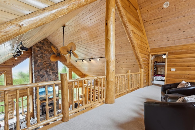 5784 Mcgowan Rd, Brainerd, MN 56401 - living room featuring high vaulted ceiling, carpet floors, a ceiling fan, wooden walls, and rail lighting