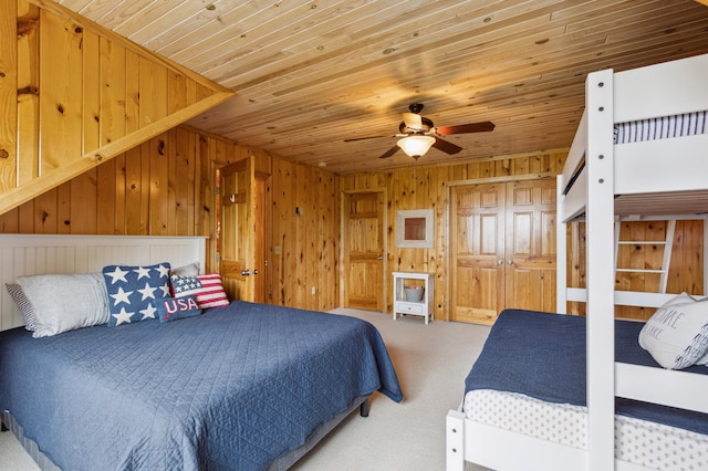5784 Mcgowan Rd, Brainerd, MN 56401 - carpeted bedroom with wood ceiling and wood walls