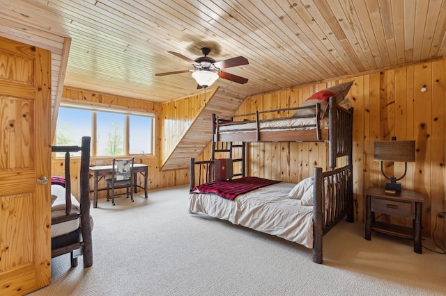 5784 Mcgowan Rd, Brainerd, MN 56401 - carpeted bedroom with wooden ceiling, wood walls, and vaulted ceiling