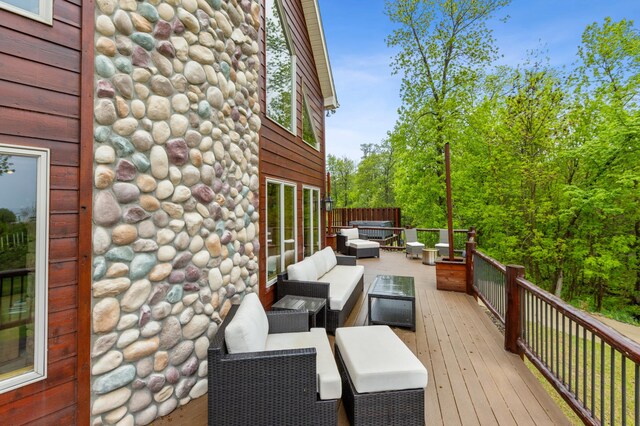 5784 Mcgowan Rd, Brainerd, MN 56401 - wooden terrace with an outdoor hangout area