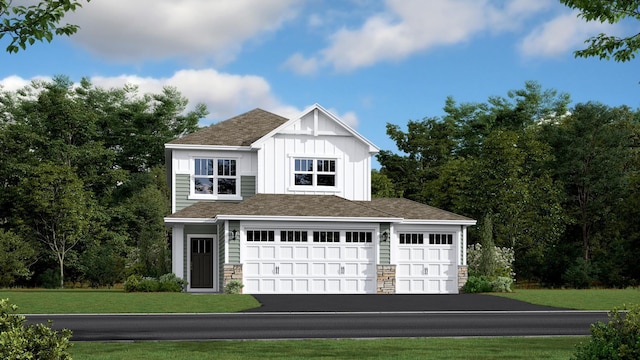 garage with asphalt driveway