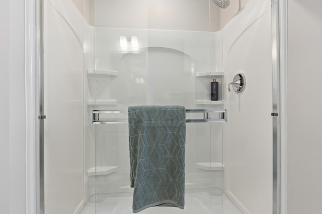 full bath featuring a stall shower