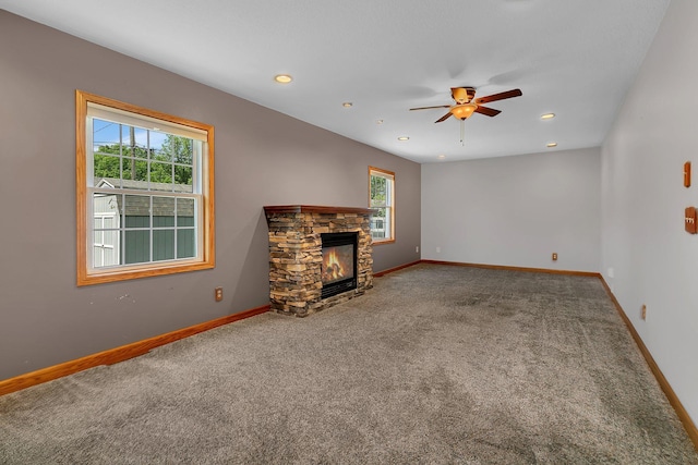 1317 8th Ave N, Saint Cloud, MN 56303 - unfurnished living room featuring carpet, plenty of natural light, baseboards, and recessed lighting