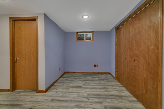 1317 8th Ave N, Saint Cloud, MN 56303 - empty room featuring baseboards and light wood-style floors