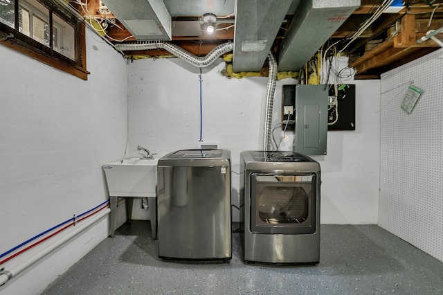 1317 8th Ave N, Saint Cloud, MN 56303 - washroom featuring separate washer and dryer and electric panel