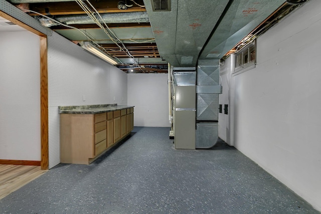 1317 8th Ave N, Saint Cloud, MN 56303 - unfinished basement featuring heating unit