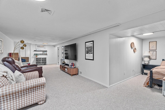 816 5th St S, Stillwater, MN 55082 - carpeted living area with a textured ceiling and baseboards