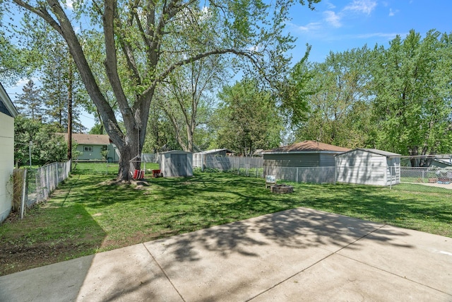 816 5th St S, Stillwater, MN 55082 - view of yard featuring a patio, a storage shed, and an outdoor structure