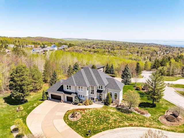 view from above of property with a forest
