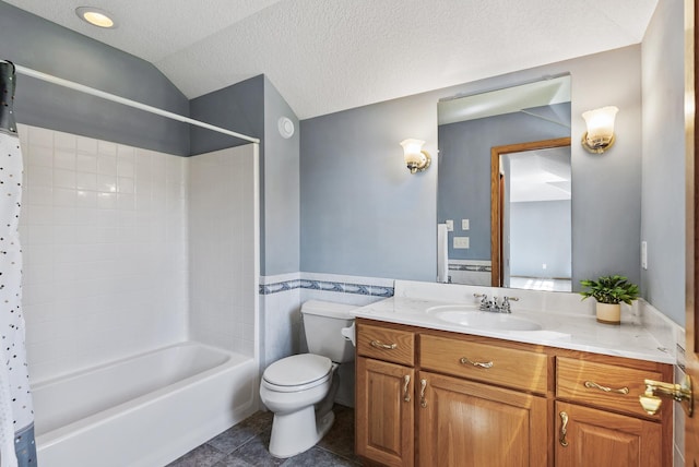 full bathroom with toilet, vanity, tub / shower combination, tile patterned floors, and vaulted ceiling