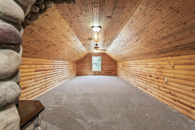 additional living space with carpet, rustic walls, wood ceiling, and vaulted ceiling