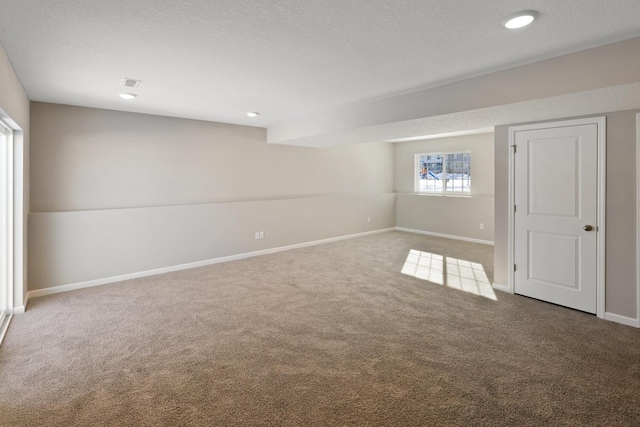 7497 147th Ln NW, Ramsey, MN 55303 - basement featuring carpet floors, baseboards, and recessed lighting