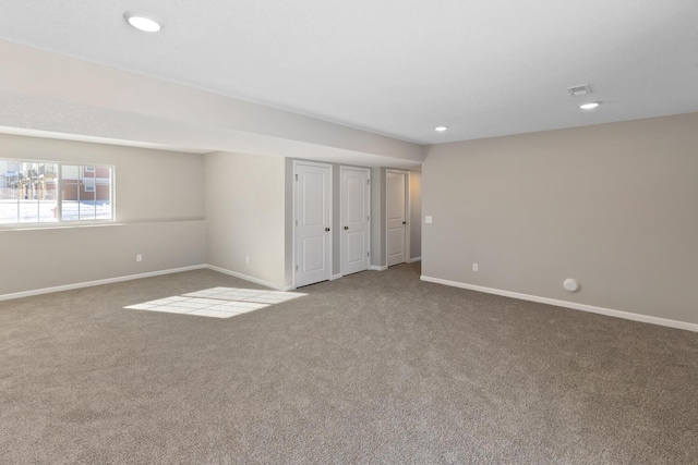 7497 147th Ln NW, Ramsey, MN 55303 - carpeted spare room featuring baseboards and recessed lighting