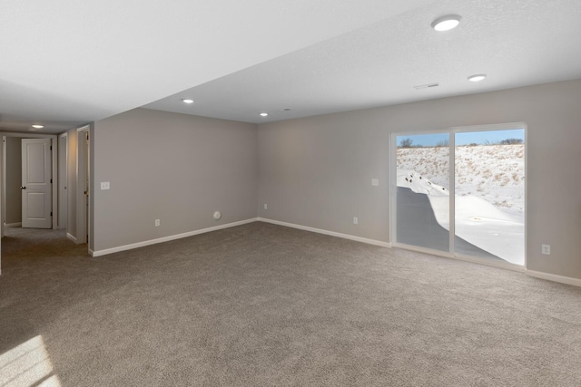 7497 147th Ln NW, Ramsey, MN 55303 - spare room featuring carpet, baseboards, and recessed lighting