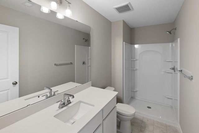 7497 147th Ln NW, Ramsey, MN 55303 - full bath with a shower, toilet, tile patterned floors, and vanity