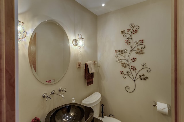 bathroom featuring toilet