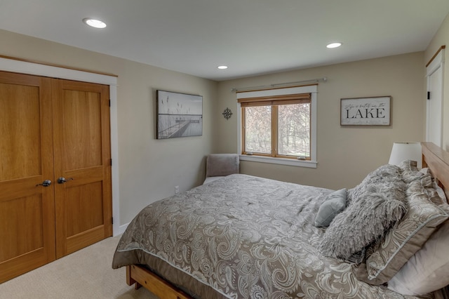 carpeted bedroom with recessed lighting