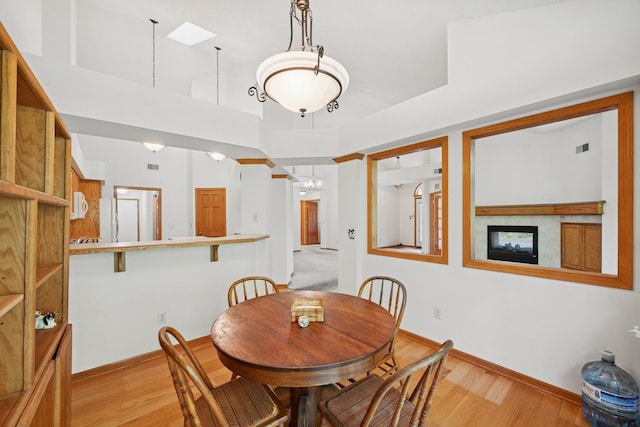 217 Canyon Dr, Hudson, WI 54016 - dining area with light wood finished floors and a skylight
